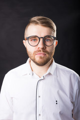 Portrait, guy and business people concept - Handsome man with glasses in white shirt looking at camera