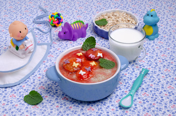 Oatmeal for baby feeding with plum jam
