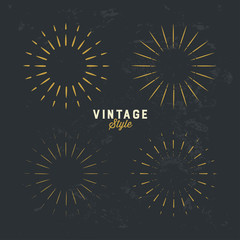 Set of Vintage gold sunburst, firework sparks vector design element on grunge dark background