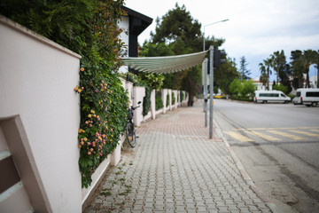 exit from hotel with canopy from the rain