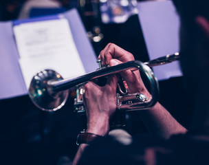 Trumpet player closeup concert music background © disq