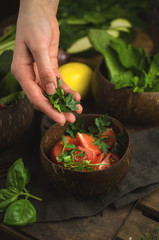 Woman preparing healthy, vegan food