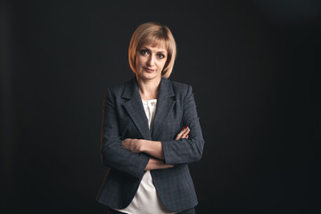 Portait of woman lawyer isolated on the dark background