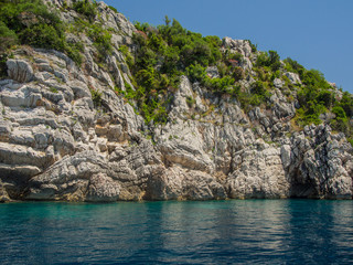 Rocky shores and blue Adriatic sea near the town of Budva, Montenegro