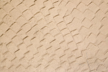 The texture of the plastered wall. Rough corrugated cement surface. Uneven angular pattern. Perfect...