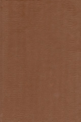 Artificial leather texture. Brown old book cover. Rough surface with embossed. Blank retro page. Empty place for text. Perfect for background and vintage style design.