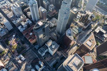 Late afternoon aerial of streets and buildings in downtown Los Angeles, California.  