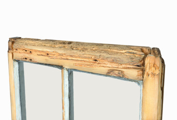 Close up of rotten sash window frame against white background