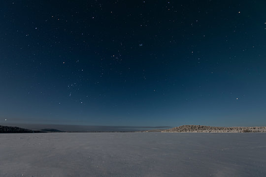 View across the lake of the night sky,