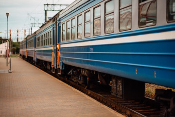 Fototapeta premium Passenger train on the station platform