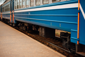 Obraz premium Passenger train on the station platform