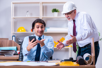 Two architects working on the project 