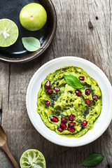 Avocado dip with Basil Olive oil and Pomegranate topping