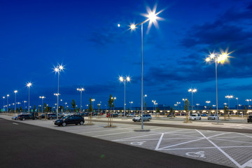 big modern empty parking lot at night