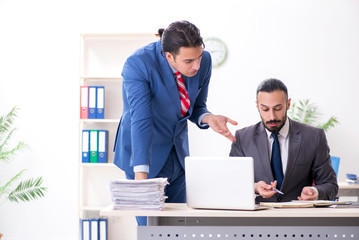 Two male colleagues in the office 