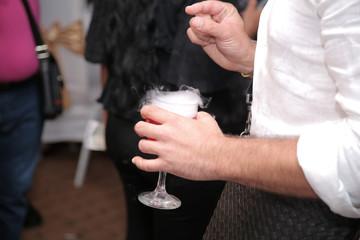 Holding smoking glass