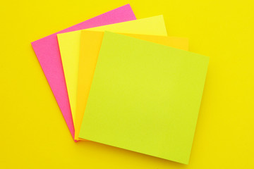 Note paper stickers on yellow background