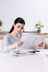 Young woman in budget planning concept 