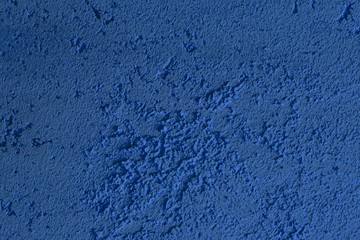 creative vintage blue stone like stucco texture for use as background.