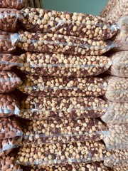 hazelNuts in packages on shelves at Farmers Market