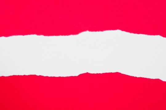 red pieces of paper on white background with copy space