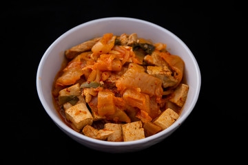 A Korean stew with fermented kimchi called Kimchi Jjigae
