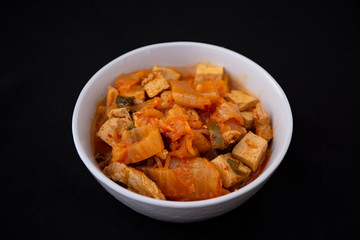 A Korean stew with fermented kimchi called Kimchi Jjigae