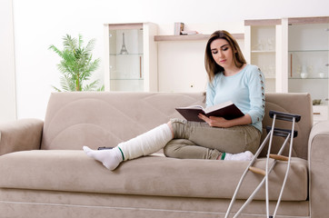 Young woman after car accident suffering at home 