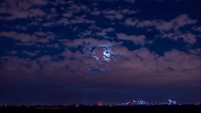 Timelapse Moon Above The City