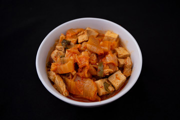 A Korean stew with fermented kimchi called Kimchi Jjigae