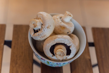 whole fresh mushrooms in a bowl