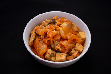 A Korean stew with fermented kimchi called Kimchi Jjigae