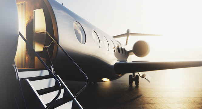 Business private jet airplane parked at terminal. Luxury tourism and business travel transportation concept. Closeup. 3d rendering