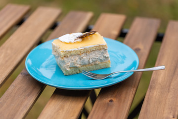 Cream nut cuts on a plate with a fork