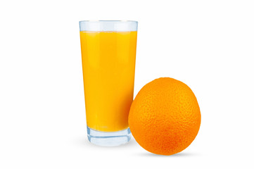 The orange lies next to a glass that pours orange juice.