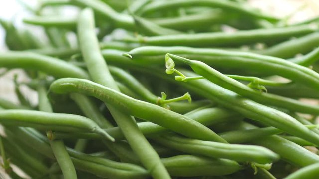closeup of fresh green asparagus stems. Vegetable dishes. Rotation 360. 4K