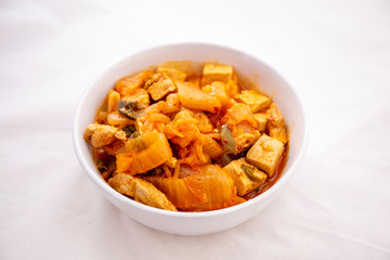 A Korean stew with fermented kimchi called Kimchi Jjigae