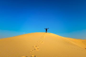 Fototapeta na wymiar Adventure Photographer in Desert Dammam Saudi Arabia