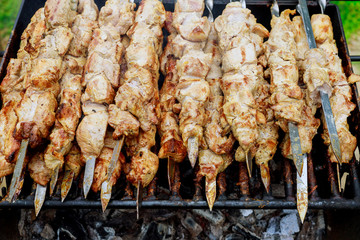 Meat skewers being grilled barbecue