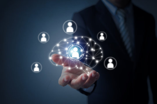 Innovation and creative market concept, business man holding digital image of brainstorming  in palm, imagination power