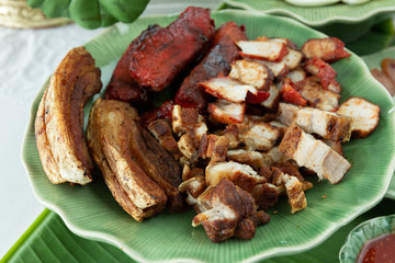 Barbecued red pork in sauce with rice