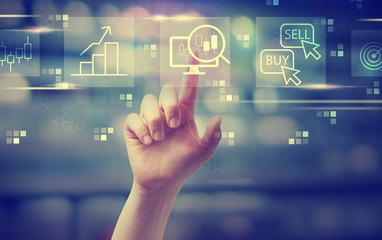 Stock trading theme with hand pressing a button at night