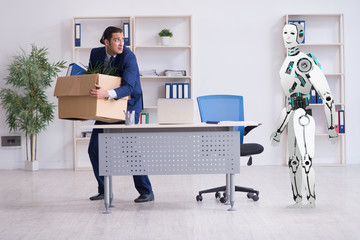 Concept of robots replacing humans in offices