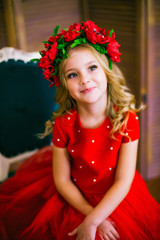 Small girl smile , fashion. Child smiling with blond hairstyle in red dress. Beauty salon concept. Haircare, hairdresser, barber. Punchy pastel trend
