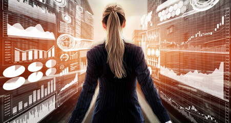 Big Data Technology for Business Finance Analytic Concept. Modern graphic interface shows massive information of business sale report, profit chart and stock market trends analysis on screen monitor.