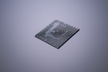 Close up levitation of Semiconductor BGA IC microchip on white isolated background