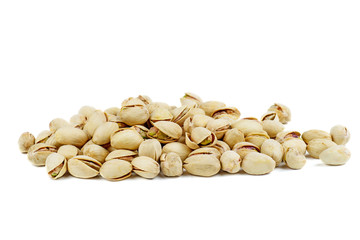 Roasted pistachios isolated on white background