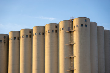 silos on background of blue sky