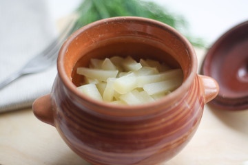 Pot roast, dill, napkin and fork