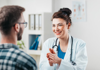 Woman Doctor prescribes medicine to Young Patient